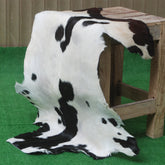 Decorative Black and White Goat Skin Rug - Genuine Leather for Sophisticated Spaces