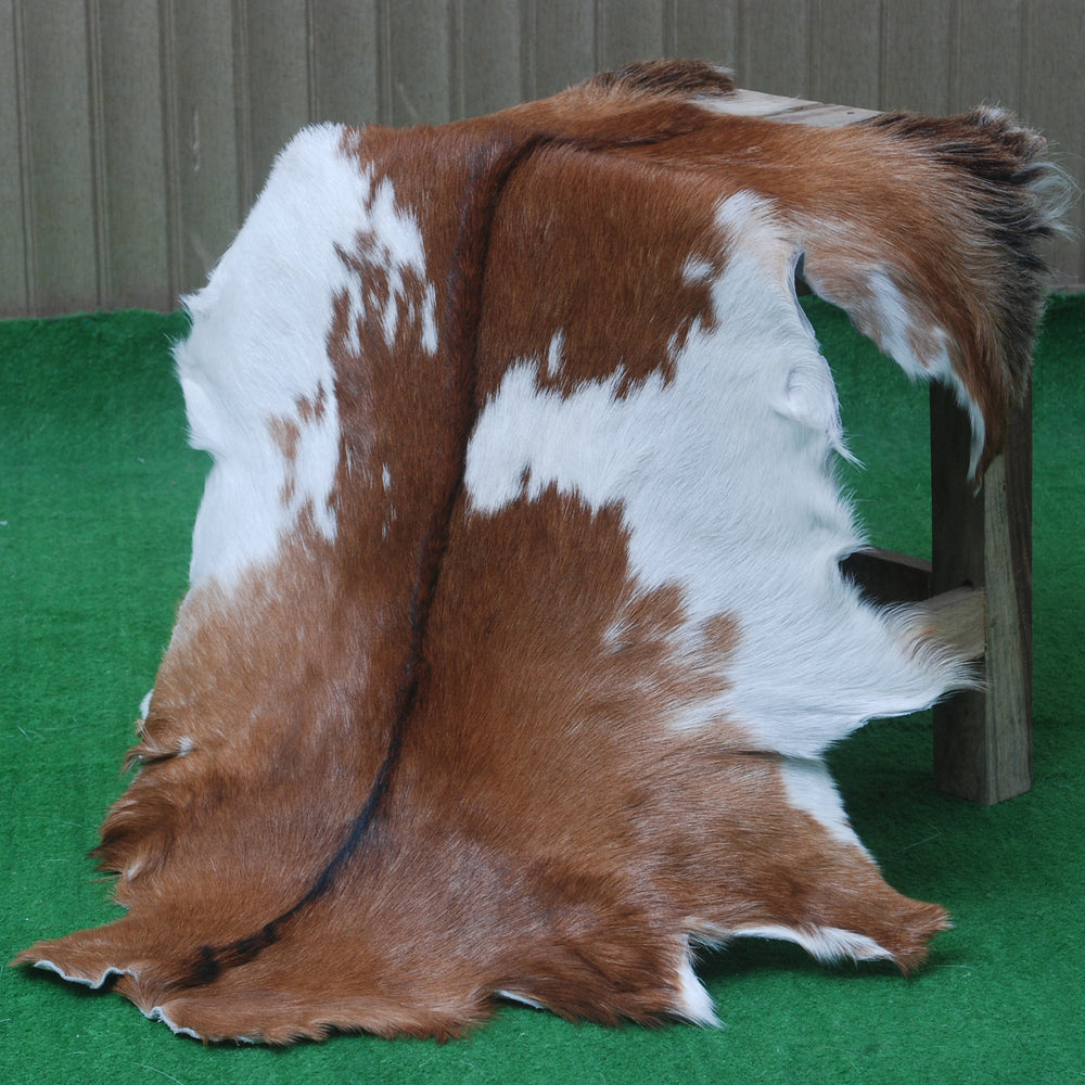 Handcrafted Dark Brown Goat Skin Rug – Authentic Elegance for Your Home - Celestial Leather Limited