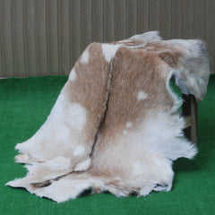 Brown and White Handmade Goat Skin Rug – Classic Elegance for Your Home