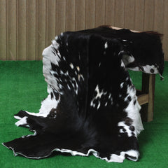 Decorative Black and White Goat Skin Rug - Genuine Leather for Sophisticated Spaces
