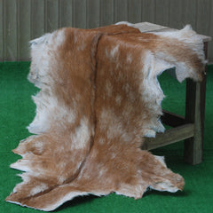 Brown and White Handmade Goat Skin Rug – Classic Elegance for Your Home