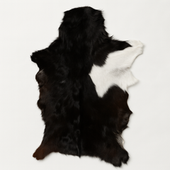 Authentic Black and White Goat Skin Rug - Perfect for Modern and Classic Décor