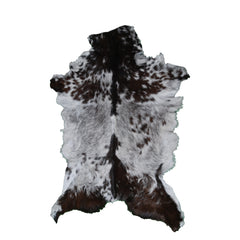 Elegant Black and White Goat Hide Rug - Perfect Accent for Any Room