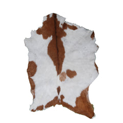 Handcrafted Brown and White Goat Skin Rug - Soft, Durable, and Elegant Décor
