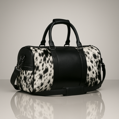 Luxury Black White Cowhide Leather Travel Tote Bag for Weekend Trips - Handcrafted Duffle with Pony Hair Finish, Adjustable Shoulder Strap