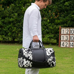 Luxury Black White Cowhide Leather Travel Tote Bag for Weekend Trips - Handcrafted Duffle with Pony Hair Finish, Adjustable Shoulder Strap