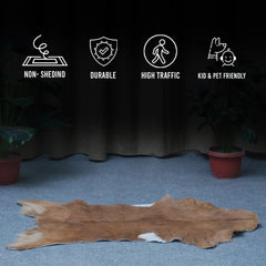 Elegant Brown and White Goat Hide Rug - Perfect Accent for Living Room or Bedroom