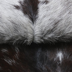 Elegant Black and White Goat Hide Rug - Perfect Accent for Any Room