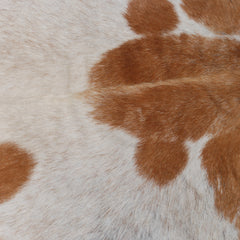 Elegant Brown and White Goat Hide Rug - Perfect Accent for Living Room or Bedroom