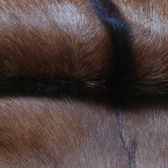 Luxurious Brown and Black Goat Hide Rug with Unique Patterns and Non-Slip Suede Back - Sustainable Eco-Friendly Accent Piece - Celestial Leather Limited