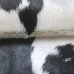 Decorative Black and White Goat Skin Rug - Genuine Leather for Sophisticated Spaces
