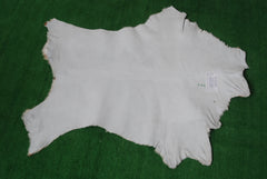 Rustic Brown and White Goat Skin Rug - Unique Pattern for Modern and Classic Décor