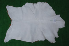 Handcrafted Brown and White Goat Skin Rug - Soft, Durable, and Elegant Décor