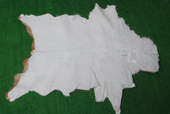 Luxurious Brown & White Genuine Goat Skin Rug for Home Décor - Celestial Leather Limited