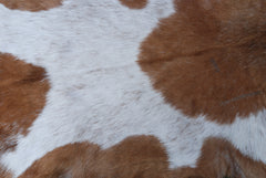 Luxurious Brown and Black Goat Skin Rug - Sustainable Hair-on Goat Hide Rug for Home Décor - Celestial Leather Limited