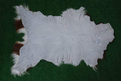 Luxurious Brown and White Premium Goat Hide Hair-on Rug - Handpicked, Handcrafted, and Eco-Friendly Sheepskin Rug for Home Décor