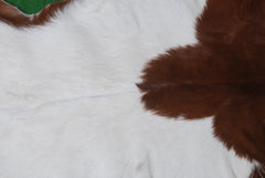 Luxurious Brown and White Premium Goat Hide Hair-on Rug - Handpicked, Handcrafted, and Eco-Friendly Sheepskin Rug for Home Décor