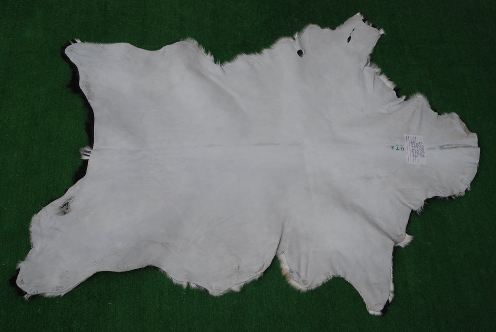 Luxurious Handmade Black & White Goat Skin Rug - Soft, Pet-Friendly, Hypoallergenic, & Eco-Friendly - Unique Statement Piece for Your Home - Celestial Leather Limited