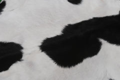 Serene Grey & White Goat Skin Rug - Natural Animal Hide Floor Decor with Suede Back - Sustainable, Eco-Friendly, and Hypoallergenic