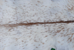 Handcrafted Brown and White Goat Skin Rug - Soft, Durable, and Elegant Décor - Celestial Leather Limited