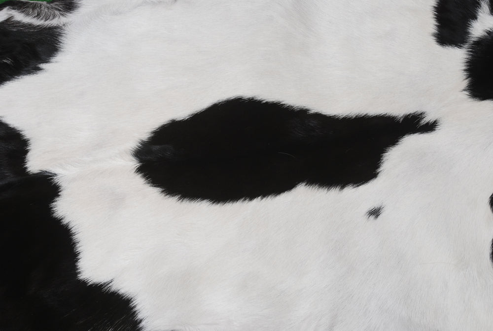 Luxury Black & White Goat Skin Rug - Modern Chic Decor, Natural Softness, Hypoallergenic, Eco-Friendly, Unique Pattern, Non-Slip Backing - Celestial Leather Limited