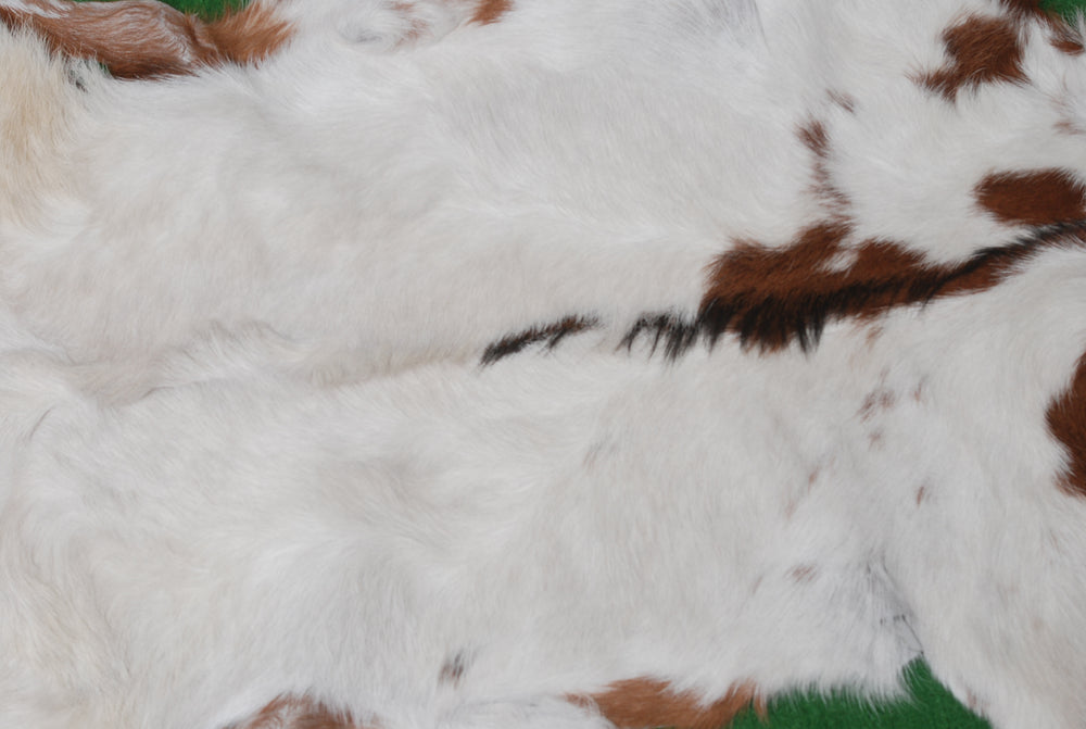 Luxurious Brown and White Goat Hide Rug | Handcrafted Premium Goatskin Rug - Sustainable, Eco-friendly, Hypoallergenic, Non-slip Suede Back - Celestial Leather Limited