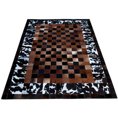 Luxurious Handmade Cowhide Patchwork Rug with Zig Zag Stitching - Unique Leather Area Rug for Home Décor - Customizable Designs Available
