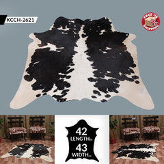 Luxurious Medium Black and White Cowhide Rug - Hypoallergenic, Handcrafted, and Durable for Modern Home Decor - Celestial Leather Limited
