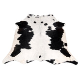 Luxurious Black and White Cowhide Rug - Hypoallergenic, Non-Slip, Handcrafted, Unique Beauty - Adds Sophistication to Any Room - Celestial Leather Limited
