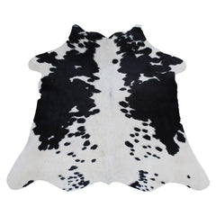 Luxurious Natural Dark Brown and White Small Animal Print Cowhide Rug with Hypoallergenic and Non-Slip Backing - Free Shipping UK - Celestial Leather Limited
