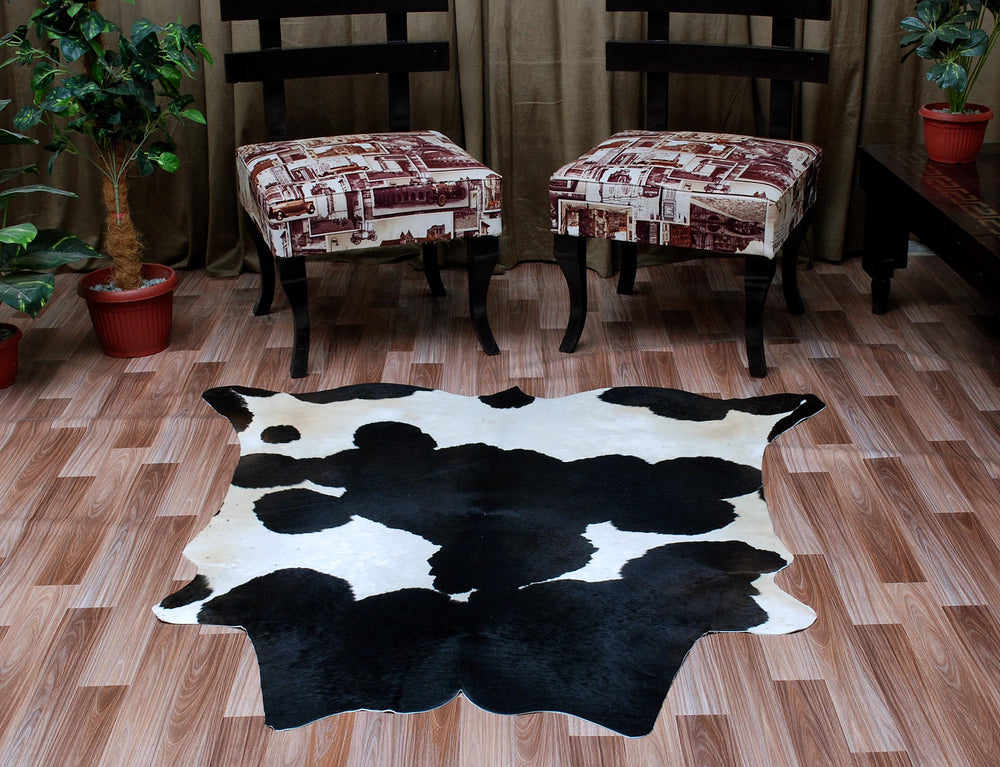 Luxurious Black & White Cowhide Rug | Handcrafted Medium Rug for Modern Home Décor | Hypoallergenic, Durable - Unique Beauty - Celestial Leather Limited