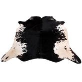 Handpicked Large Animal Print Cowhide Rug with Non-Slip Backing - Hypoallergenic & Luxurious Black - White Centre Piece for Bedroom - Celestial Leather Limited