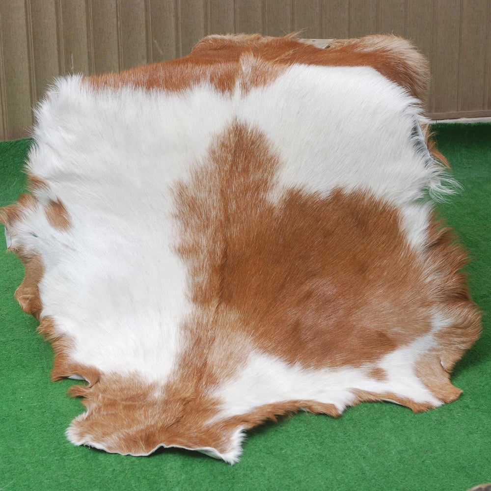 Luxury Brown and White Natural Goat Skin Rug with Modern Graphic Pattern for Stylish Wall Décor - Hypoallergenic and Non-Shedding, - Celestial Leather Limited