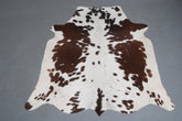 Luxurious Natural Cowhide Rug in Classic Brown and White | Medium Size | Handcrafted with Non-Slip Suede | Unique and Durable Addition to - Celestial Leather Limited