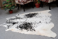 Luxurious Black & White Cowhide Rug | Hypoallergenic - Non-Slip Suede Back | Premium Quality - Unique Natural Beauty | Ideal for Bedroom - Celestial Leather Limited