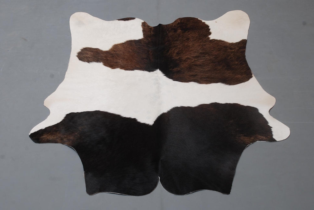 Luxurious Natural Cowhide Rug for Rustic Home Decor - Hypoallergenic, Non-Slip Backing, Handcrafted with Unique Beauty - Celestial Leather Limited