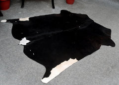 Luxurious Black and White Cowhide Rug - Hypoallergenic, Handcrafted, Unique Beauty - Medium Size for Home Decor - Celestial Leather Limited