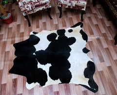 Luxurious Black & White Cowhide Rug | Handcrafted Medium Rug for Modern Home Décor | Hypoallergenic, Durable - Unique Beauty - Celestial Leather Limited