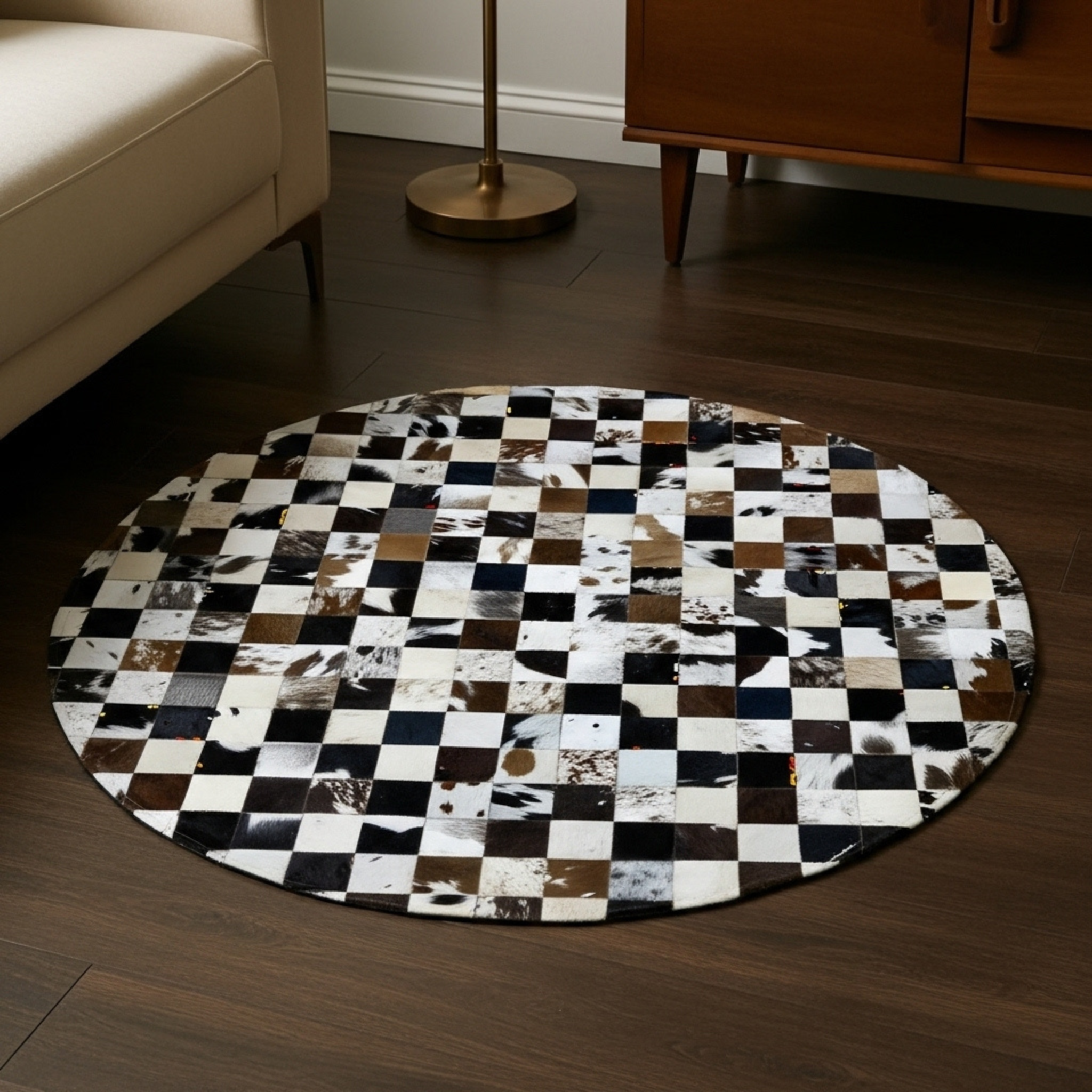 Round checkered rug with animal print pattern on a wooden floor.