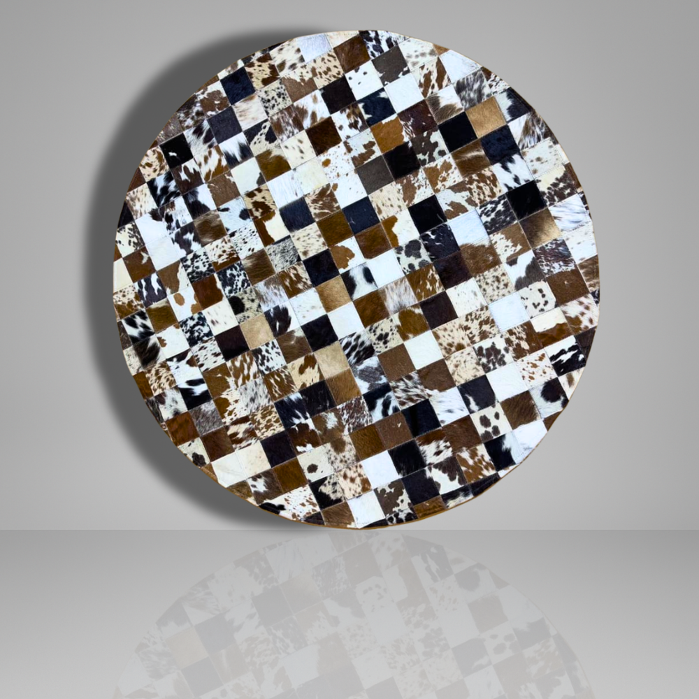 Round table with a checkered cowhide pattern on a gray background