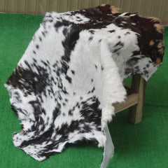 Decorative Black and White Goat Skin Rug - Genuine Leather for Sophisticated Spaces