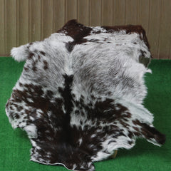 Elegant Black and White Goat Hide Rug - Perfect Accent for Any Room