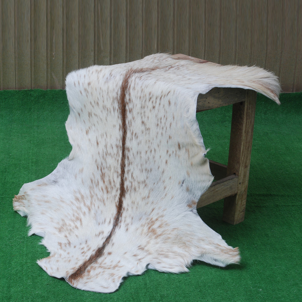 Handcrafted Brown and White Goat Skin Rug - Soft, Durable, and Elegant Décor - Celestial Leather Limited