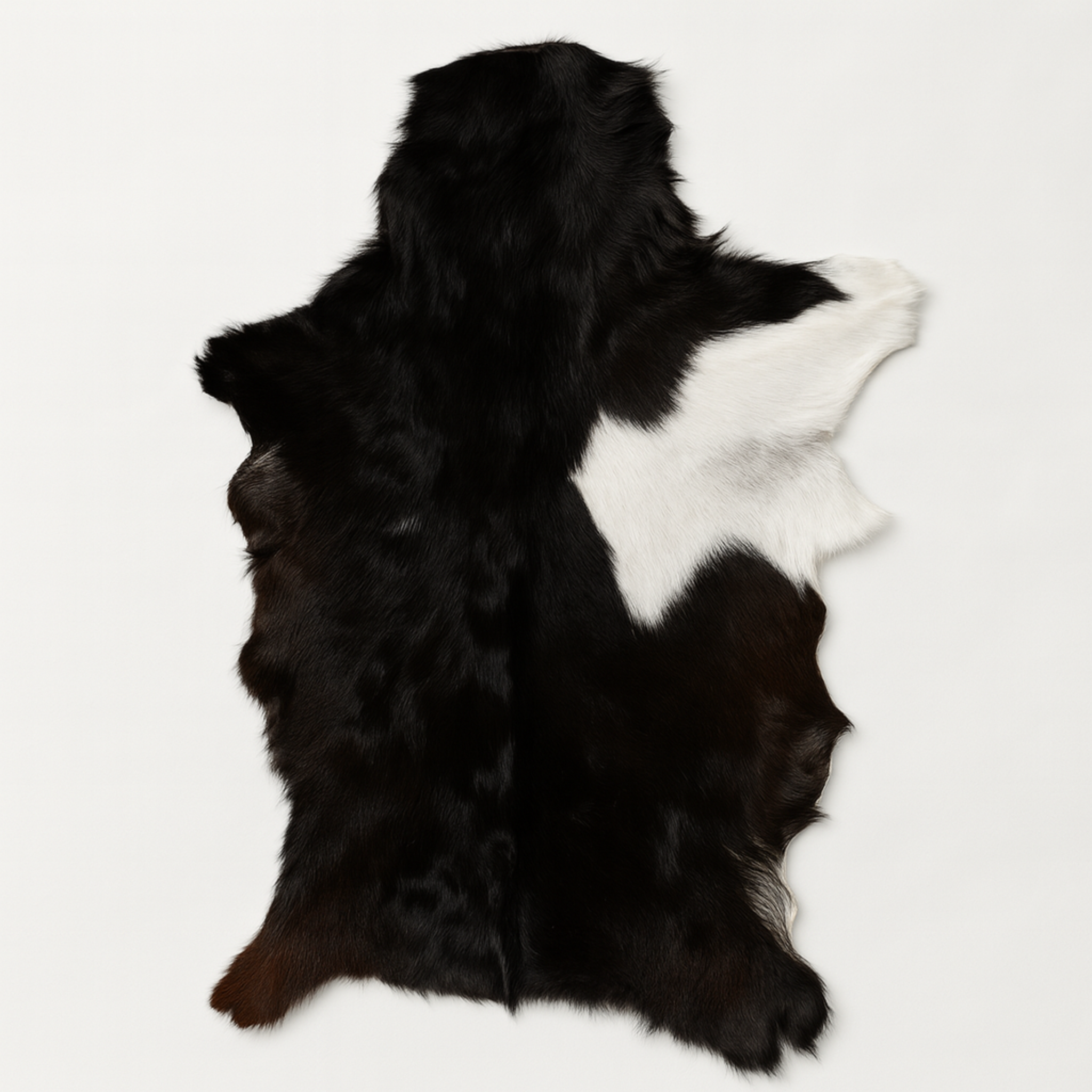 Authentic Black and White Goat Skin Rug - Perfect for Modern and Classic Décor