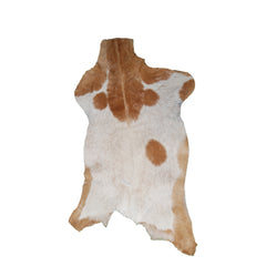 Elegant Brown and White Goat Hide Rug - Perfect Accent for Living Room or Bedroom