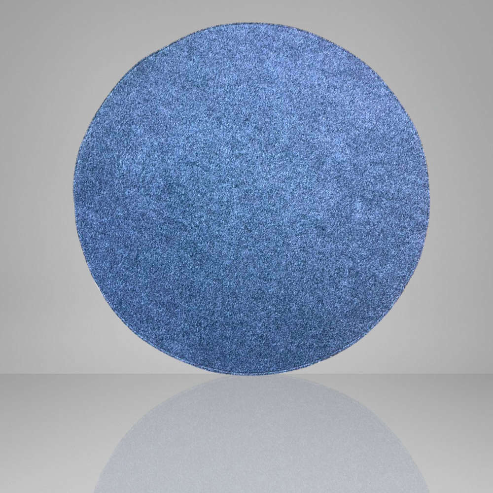 Blue textured circular object on a gray background