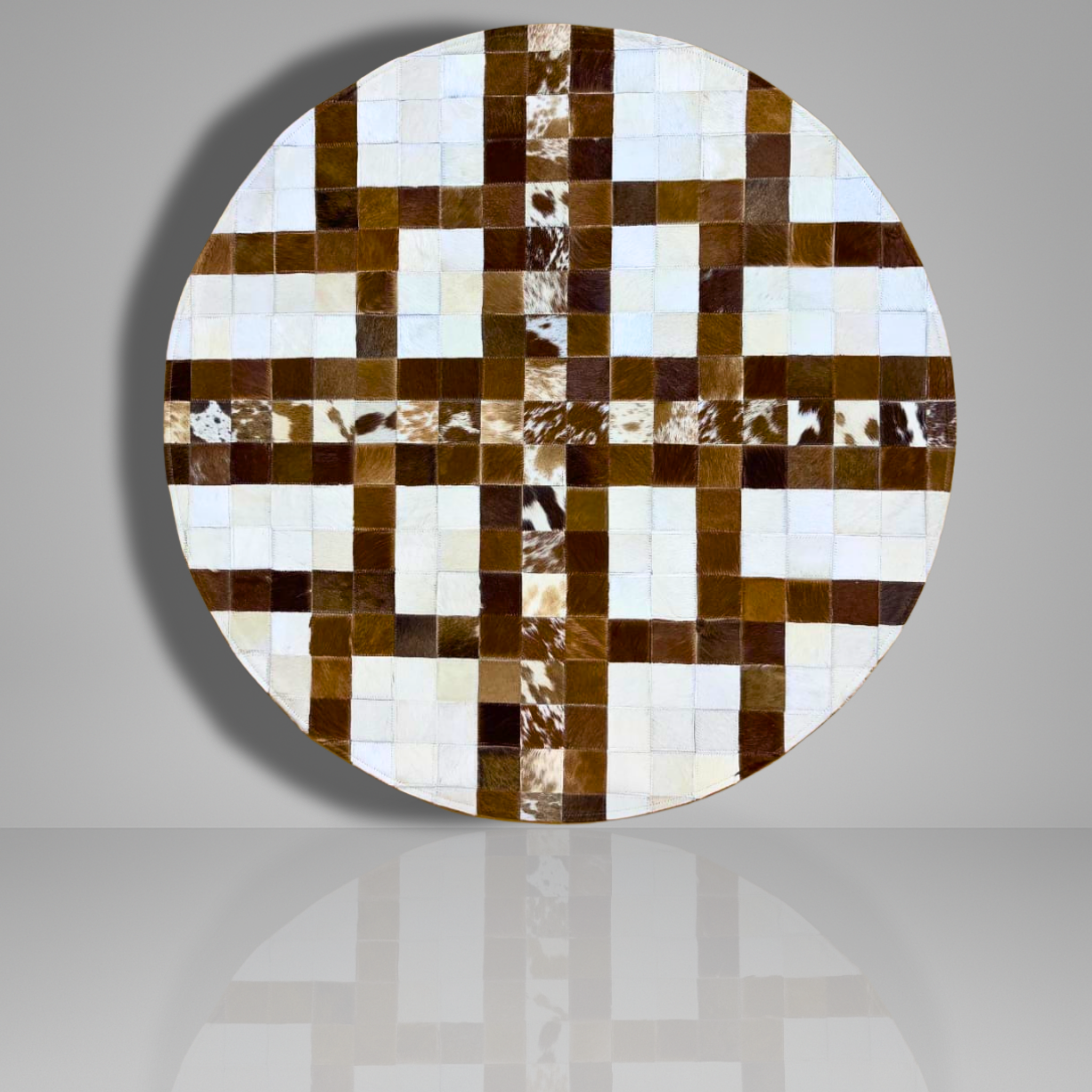 Round wall art piece with a checkered pattern of brown, white, and beige colors on a gray background.