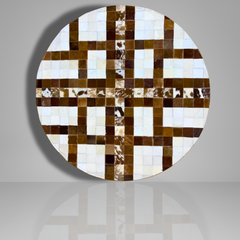 Round wall art piece with a checkered pattern of brown, white, and beige colors on a gray background.