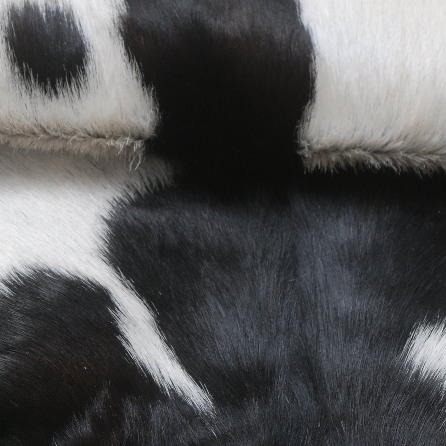 Black and White Handmade Goat Skin Rug – Natural Luxury for Your Home