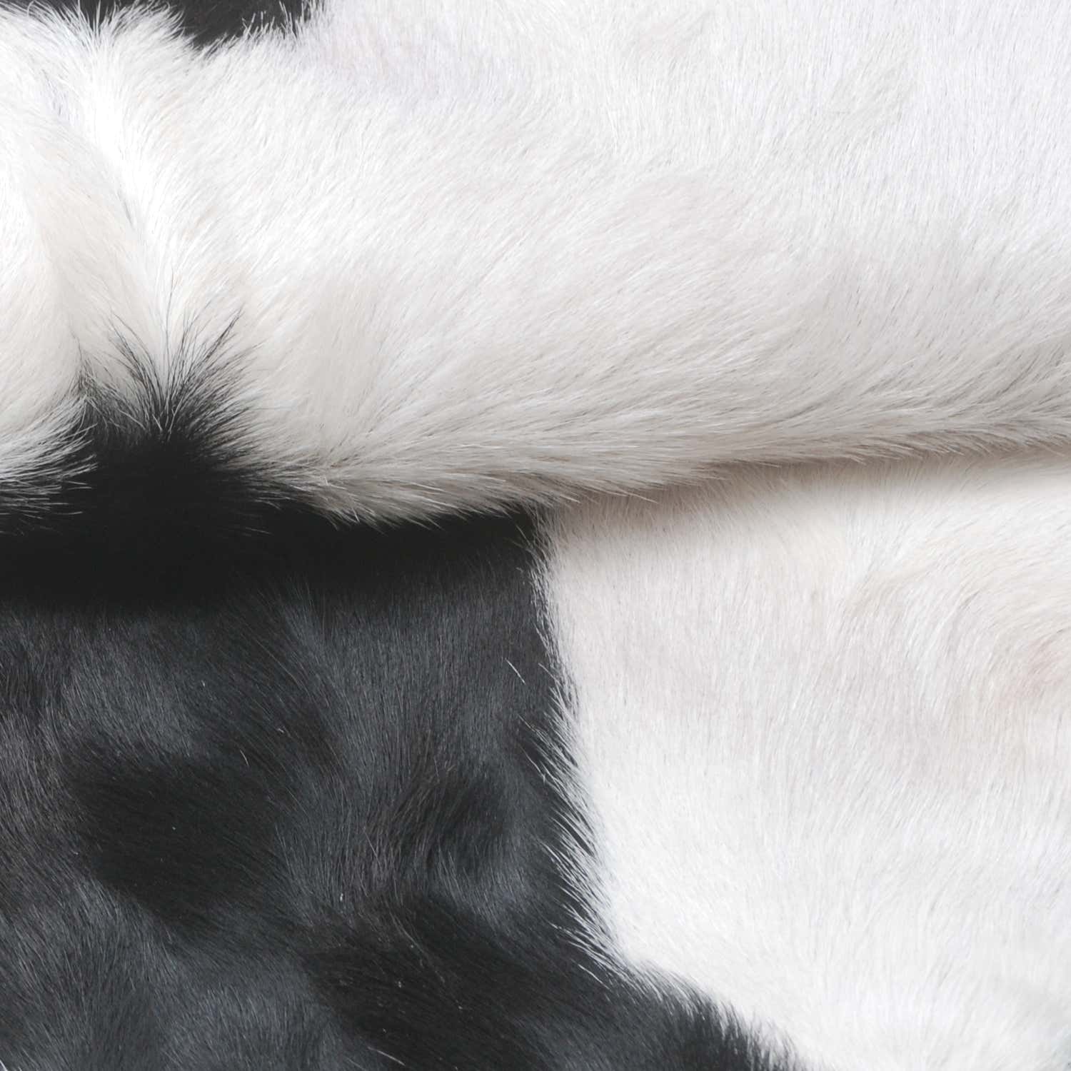 Serene Grey & White Goat Skin Rug - Natural Animal Hide Floor Decor with Suede Back - Sustainable, Eco-Friendly, and Hypoallergenic